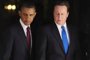 Twins of Evil. Uk Prime Minister David Cameron and American President Barack Obama plan Syria regime change